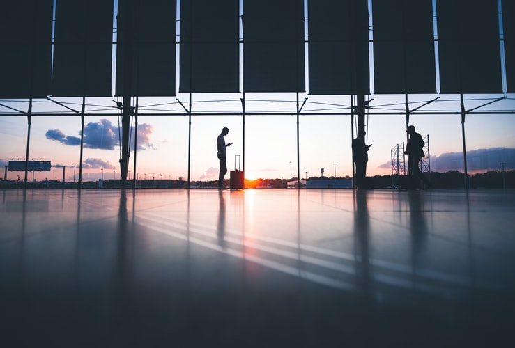 person waiting to be picked up from the airport